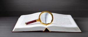 open book magnifying glass - Quiz